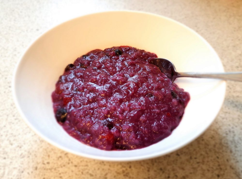 Cherry and blueberry rice porridge