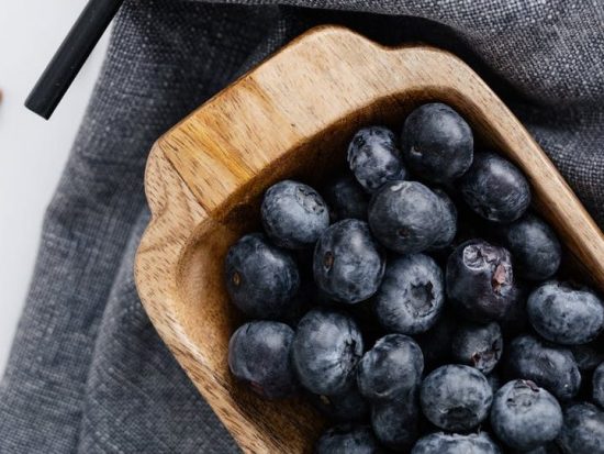 berries on wooden trays