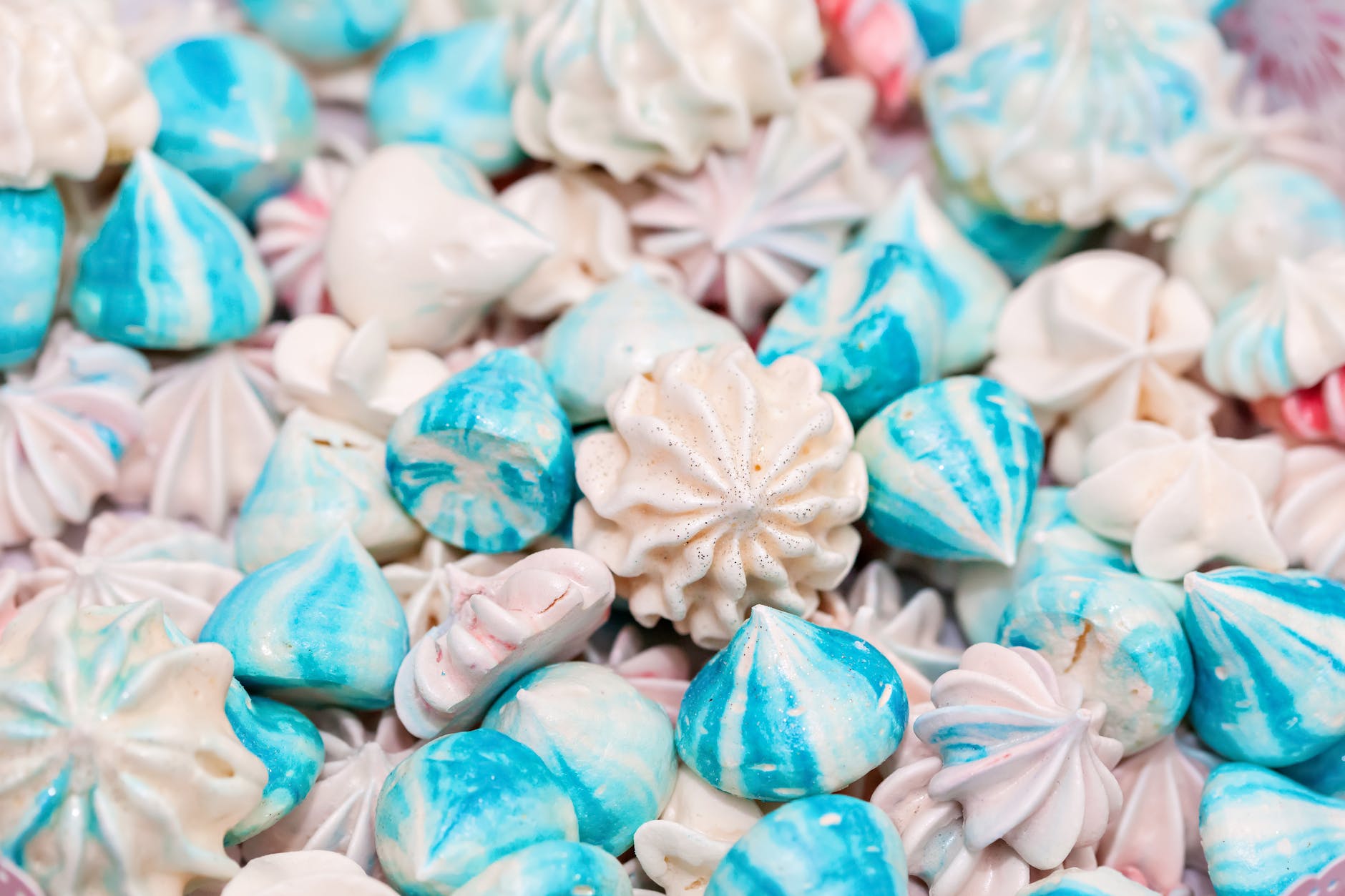 white and blue meringue in close up photography