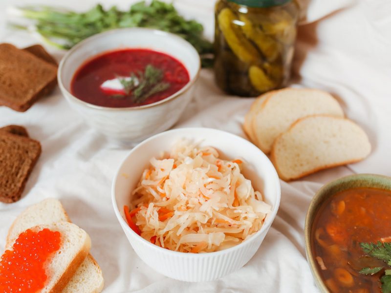 a delicious bowls of food with slices of breads and salmon roe