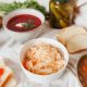 a delicious bowls of food with slices of breads and salmon roe